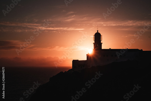 Lighthouse of Cabo Sao Vicente at sunset, in Sagres, Portugal. Farol do Cabo Sao Vicente. South Western tip of Europe.