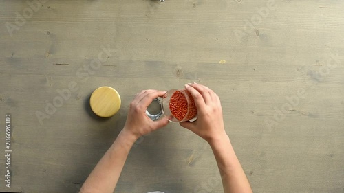 pour lentils into a colander to add to a vegan dish