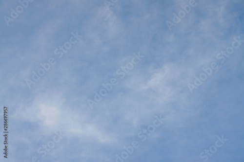 bright blue sky, white clouds, fresh and natural atmosphere