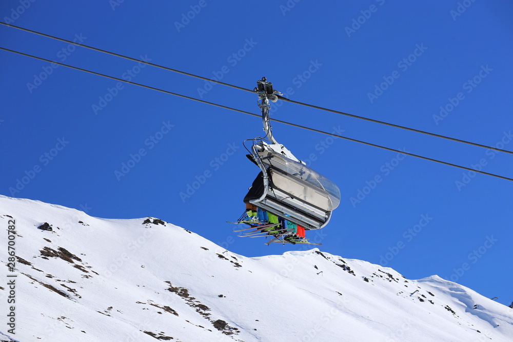 Skiers in the ski lift