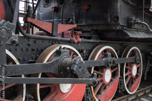 Locomotive, wheel drive mechanism. Detail. Close-up.