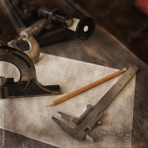 Fotografie drawing tools, concept engineering project vintage / compass pencil paper educat