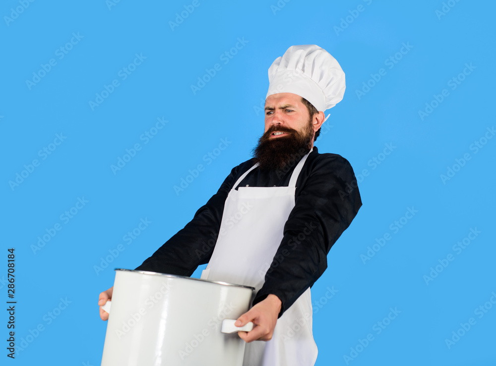 Bearded man in chef uniform with saucepan. Male chef with big pot. Chef in cap and apron holds big saucepan. Food, cuisine, cookery and gastronomy. Kitchen utensils and professional cookery concept. Bearded man in chef uniform with saucepan. Male chef with big pot. Chef in cap and apron holds big saucepan. Food, cuisine, cookery and gastronomy. Kitchen utensils and professional cookery concept.