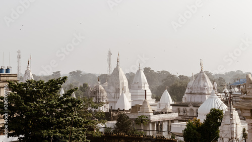 Top view of Shikharji Temple, the holiest of all Jain Teerths and one of the most visited Jain pilgrimage places in Parasnath Hills, Giridih district of Indian state of Jharkhand, India. photo