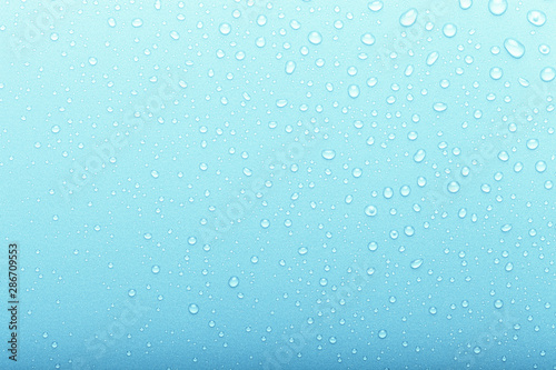 Drops of water on a color background. Selective focus. Blue. Toned © strannik_fox