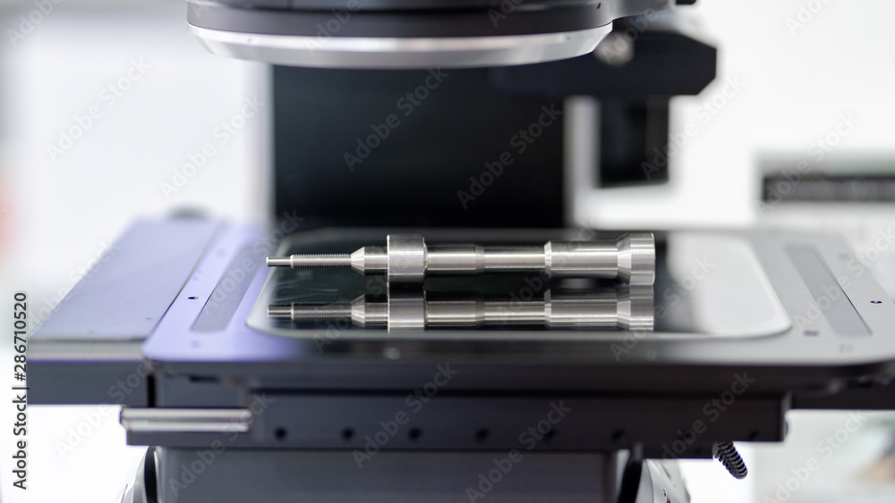 Inspection dimension high precision aluminium of automotive parts by CMM in the factory Inspection dimension high precision aluminium of automotive parts by CMM in the factory
