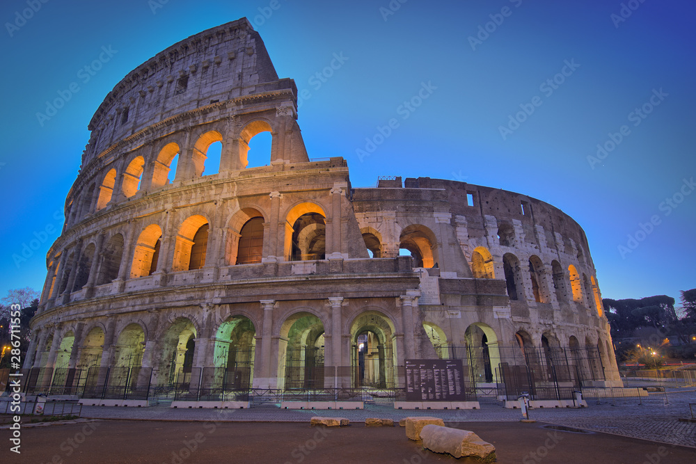 Dawn of the day before the Grand Colosseum, Rome, Italy.