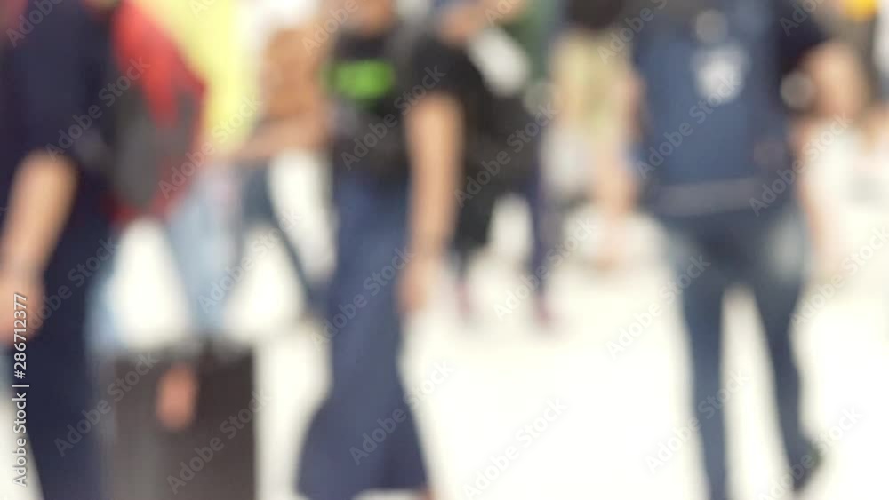 Abstract blurred background of walking people passengers In A Hall Of The airport Abstract blurred background of walking people passengers In A Hall Of The airport