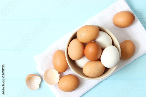 chicken eggs on a colored background. Farm products, natural eggs.