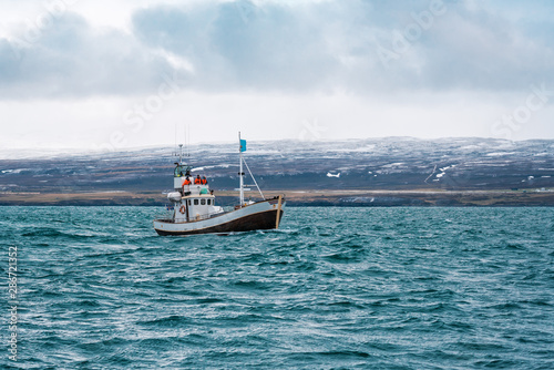 fishin boat in open ocean