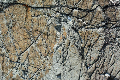 surface of stone rock in cracks