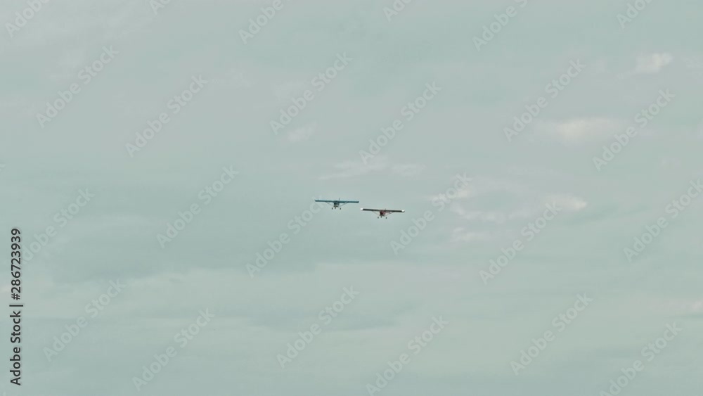 Two military aircrafts flying in the sky- overcast weather Two military aircrafts flying in the sky- overcast weather