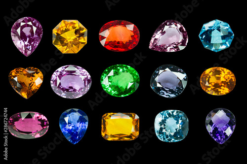 set of Bright gemstone on a black background photo