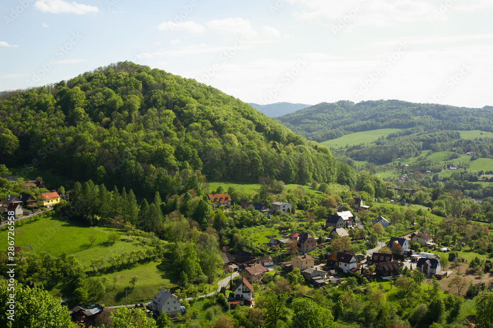 Stramberk, Czech Republic / Czechia - aerial shot of village and Kotouc hill. Green plants and trees during summer