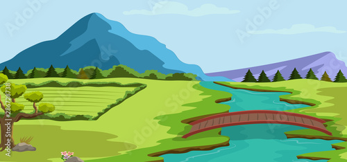 Spring landscape background with a river and mountains and vegetation