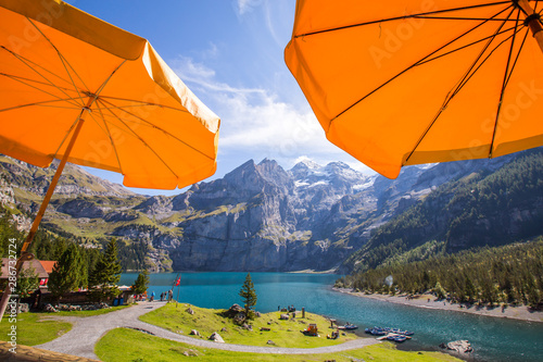The panorama in summer view over the Oeschinensee  Oeschinen lake  view from cafe