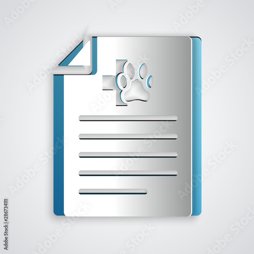 Paper cut Medical certificate for travel with dog or cat icon isolated on grey background. Document for pet. Dog or cat paw print. Paper art style. Vector Illustration