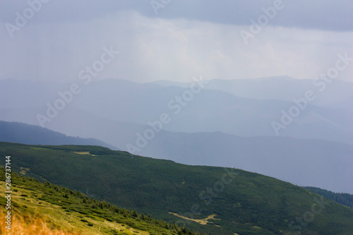 Fototapeta Naklejka Na Ścianę i Meble -  The majestic view of the beautiful mountains. Relaxing travel background. Tourist routes. Carpathians. Ukraine. Europe.
