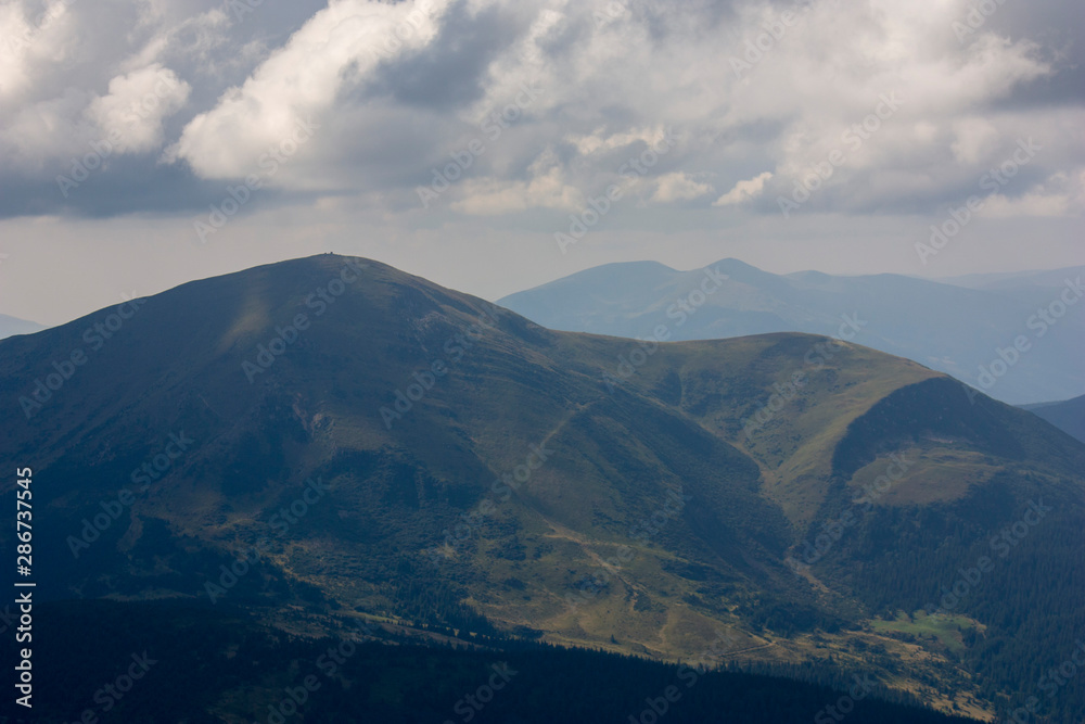 The majestic view of the beautiful mountains. Relaxing travel background. Tourist routes. Carpathians. Ukraine. Europe.