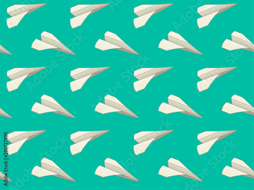 A seamless pattern of white paper airplanes