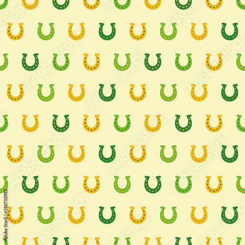 Seamless pattern with yellow and green horseshoes