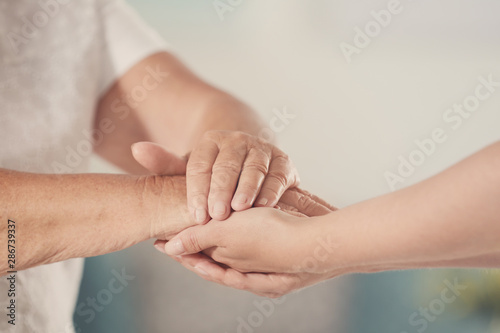 People, care and support. Giving helping hand concept