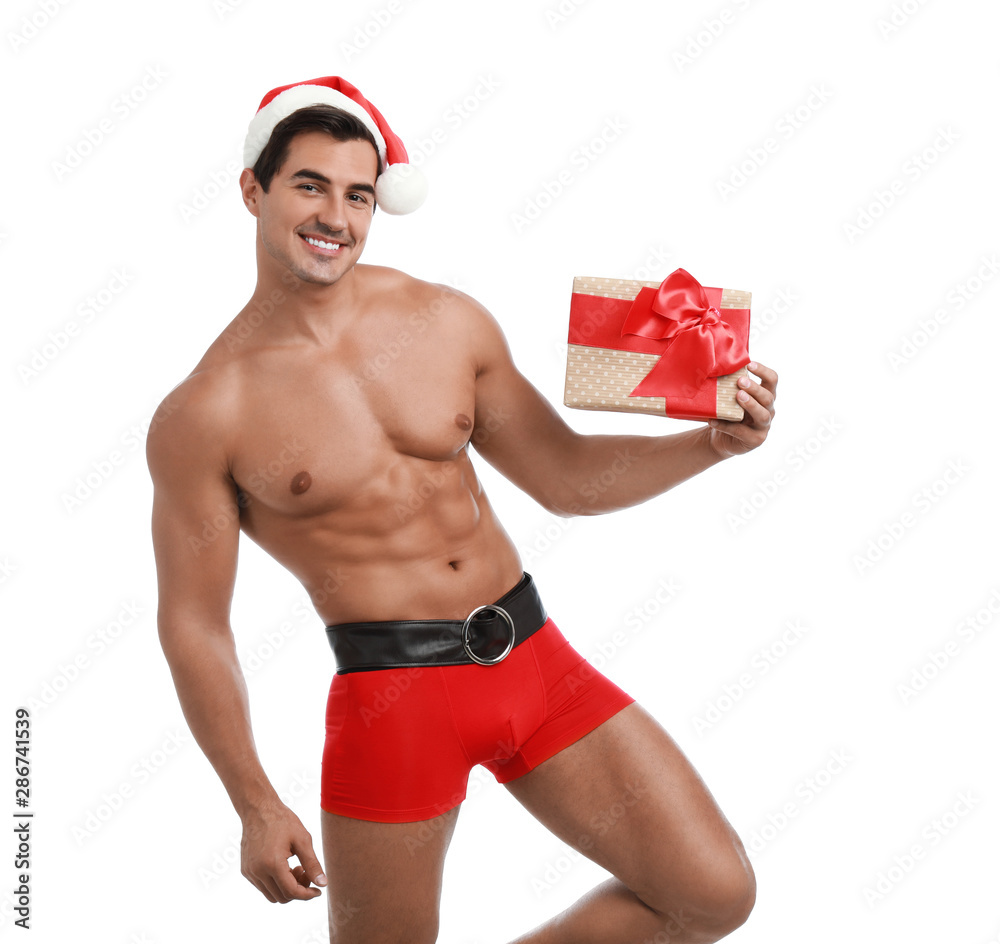 Sexy shirtless Santa Claus with gift on white background