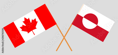 Greenland and Canada. Crossed Greenlandic and Canadian flags