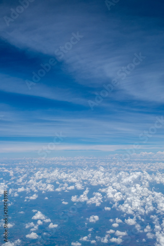 View of blue sky with cloud from airplane for background © byjeng