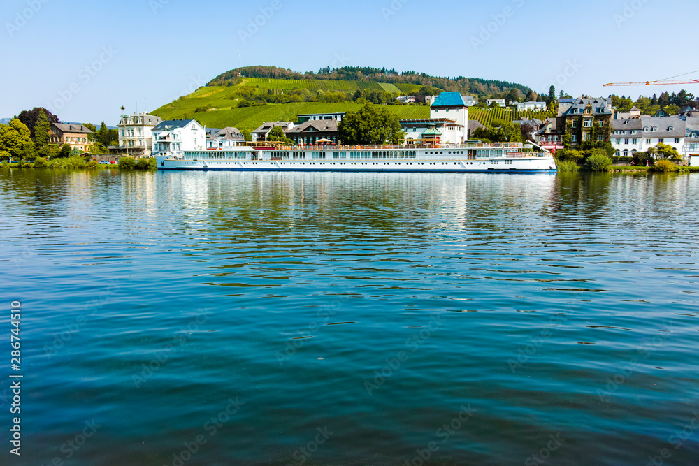 Fototapeta premium View on small German town located in Mosel river valley, quality wine regio in Germany