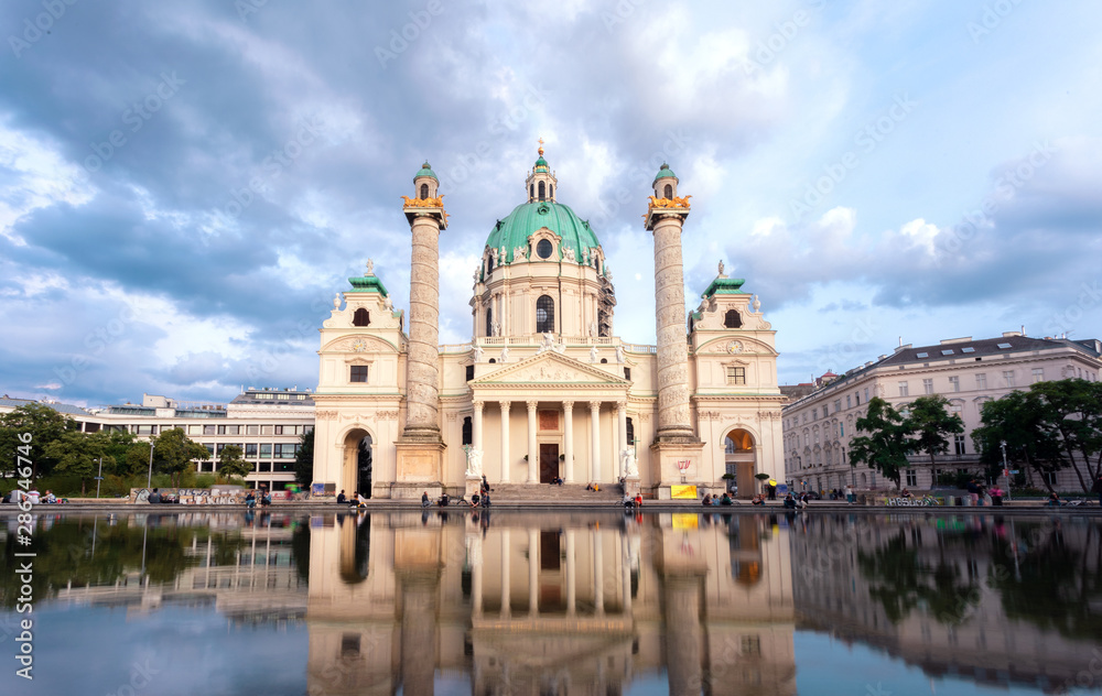 View of the baroque Karlskirche cathedral or St. Charles's Church in Vienna at sunset, Austria View of the baroque Karlskirche cathedral or St. Charles's Church in Vienna at sunset, Austria
