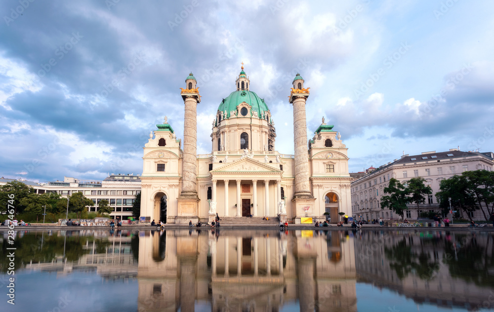 View of the baroque Karlskirche cathedral or St. Charles's Church in Vienna at sunset, Austria