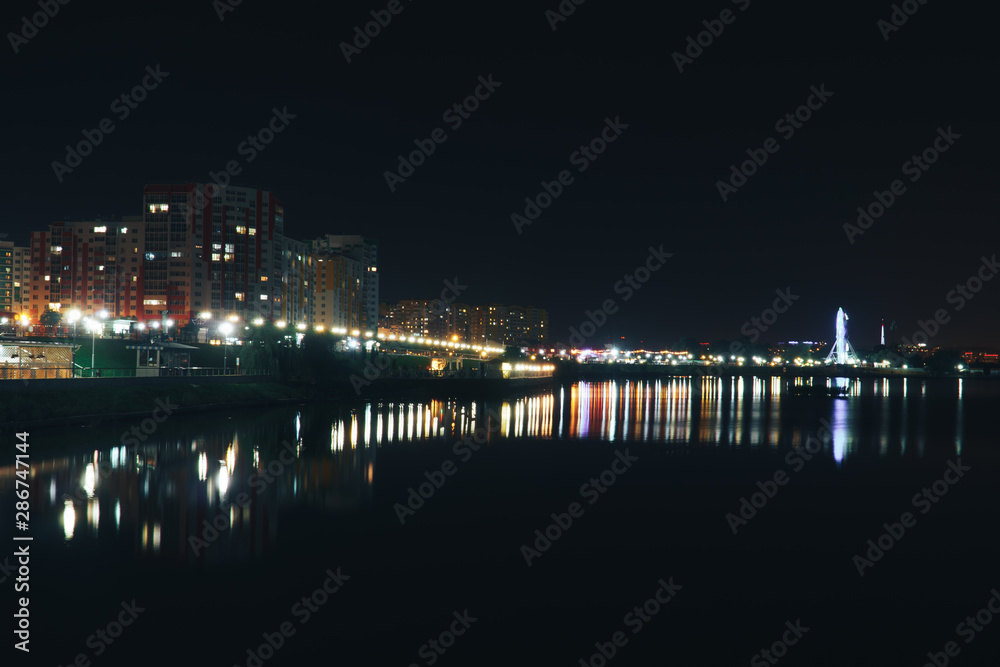 landscape of the night city by the river