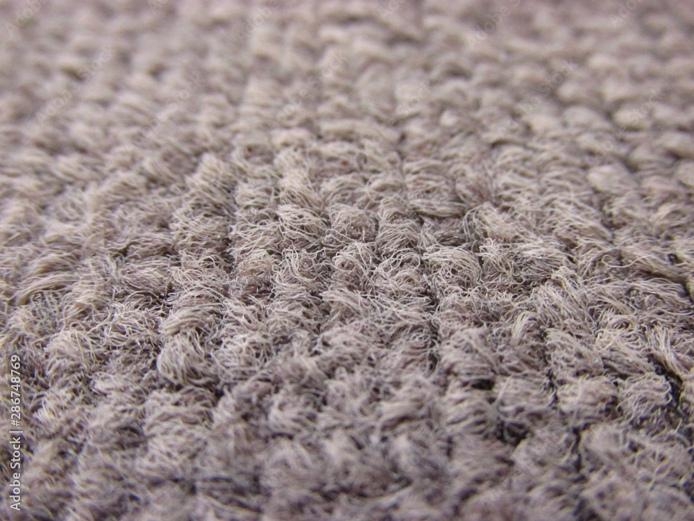 Close-up photography of gray knit textile Close-up photography of gray knit textile
