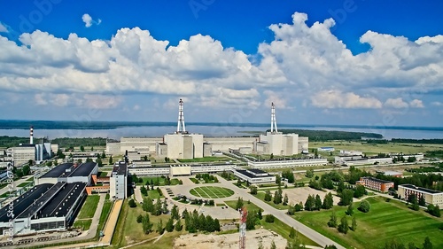 Aerial view to Ignalina nuclear power planet zone with green nature around, Lithuania photo