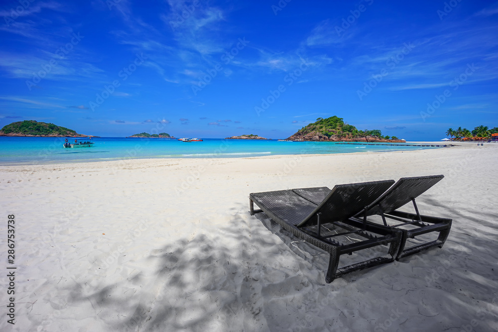 Beach chairs near the beach at Redang Island, Malaysia