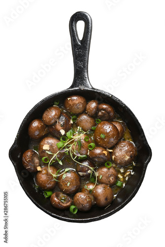 Εκτύπωση καμβά Top view of a cast iron skillet with sauteed mushrooms.