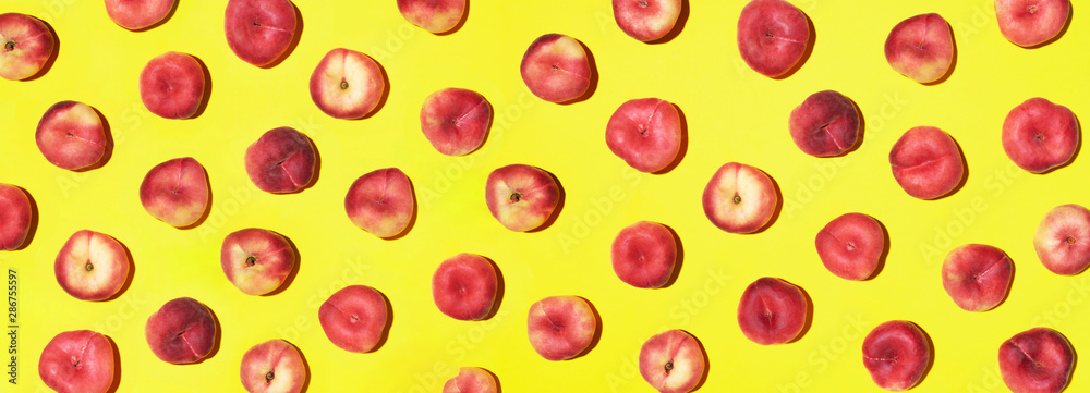 Peaches pattern on pastel yellow background. Frame made of fresh fruits. Flat lay, top view, copy space. Vegan and vegetarian diet. Banner Peaches pattern on pastel yellow background. Frame made of fresh fruits. Flat lay, top view, copy space. Vegan and vegetarian diet. Banner