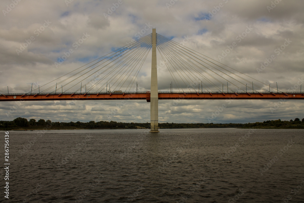 Cable-stayed bridge in Murom Russia across the Oka river on a summer cloudy day