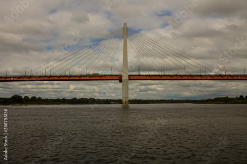 Cable-stayed bridge in Murom Russia across the Oka river on a summer cloudy day