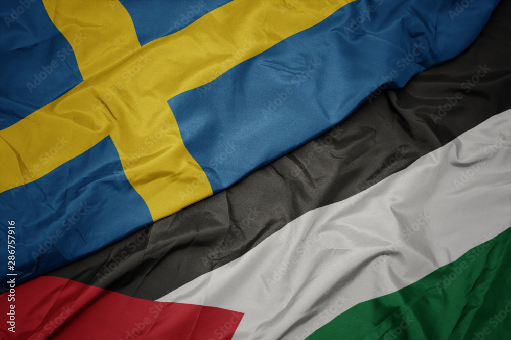 waving colorful flag of palestine and national flag of sweden. waving colorful flag of palestine and national flag of sweden.