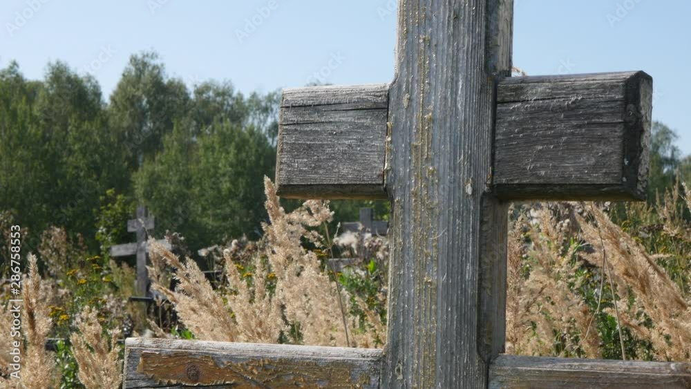 Wooden Cross In Cemetery In Sunny Summer Day Gimbal Shot Ronin. Wooden Cross In Cemetery In Sunny Summer Day Gimbal Shot Ronin.