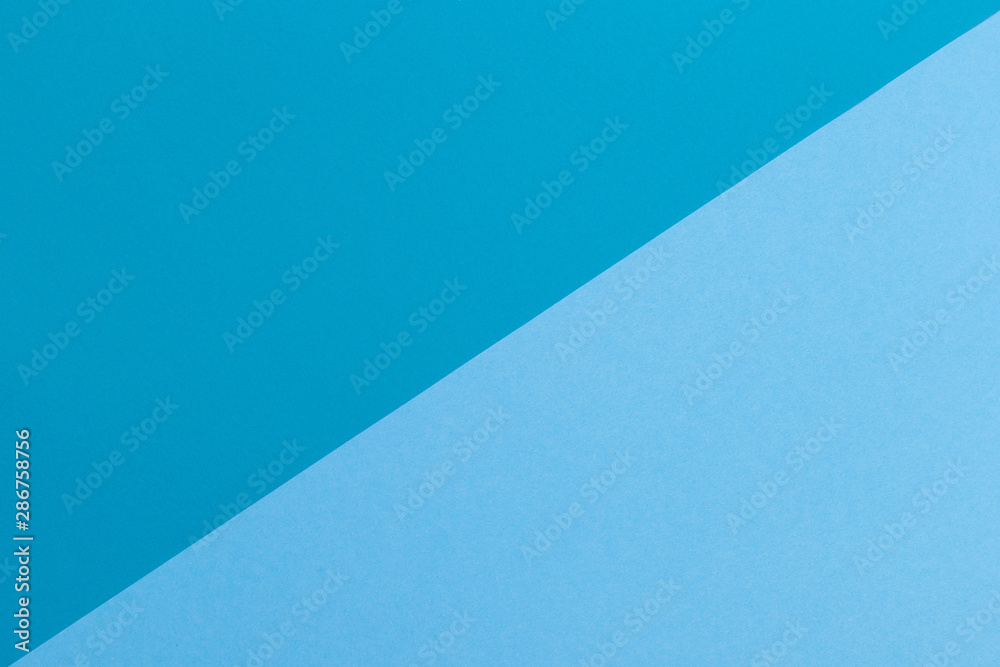 Paper blue empty background, geometrically located. Color blank for presentations, copy space.