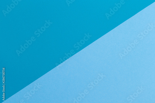 Paper blue empty background  geometrically located. Color blank for presentations  copy space.