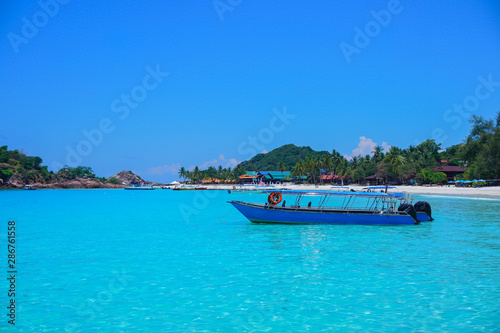 Boat on clear water near Redang Island, Terengganu, Malaysia