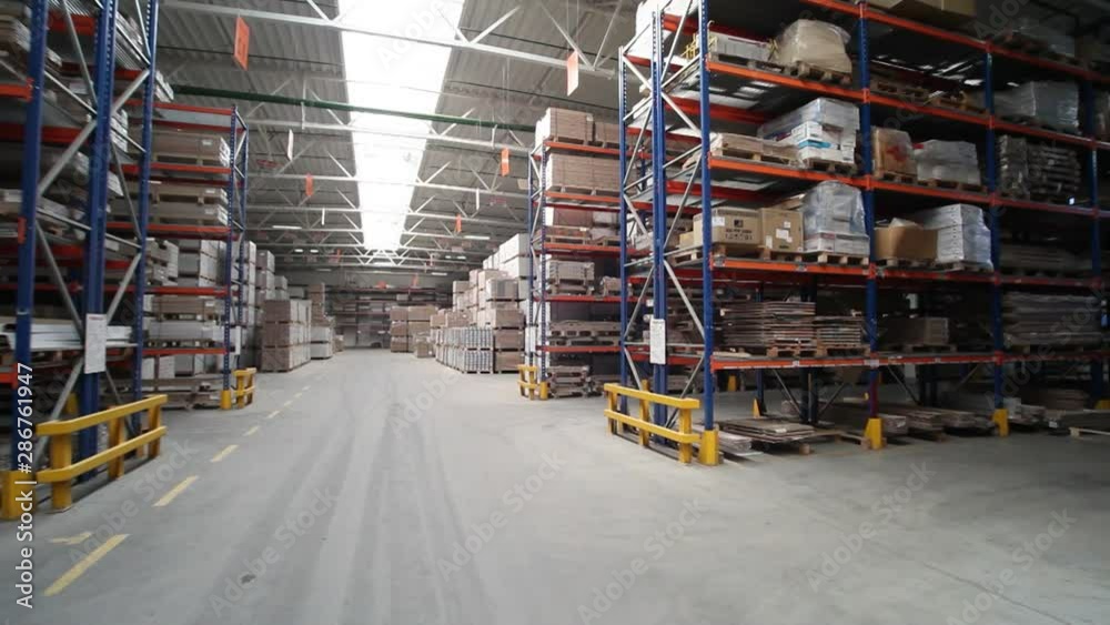 View of the storage with parquet at the factory from the inside. Business. Camera motion to around. View of the storage with parquet at the factory from the inside. Business. Camera motion to around.