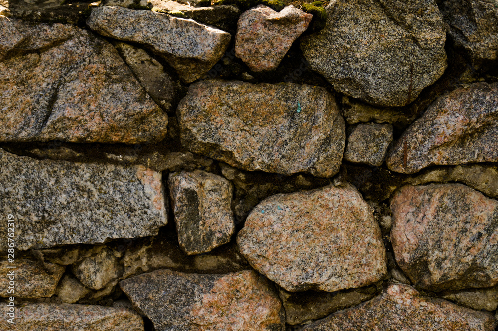 Masonry. Old masonry. The wall is built of stone. Architectural texture. Building stone. Masonry. Old masonry. The wall is built of stone. Architectural texture. Building stone.
