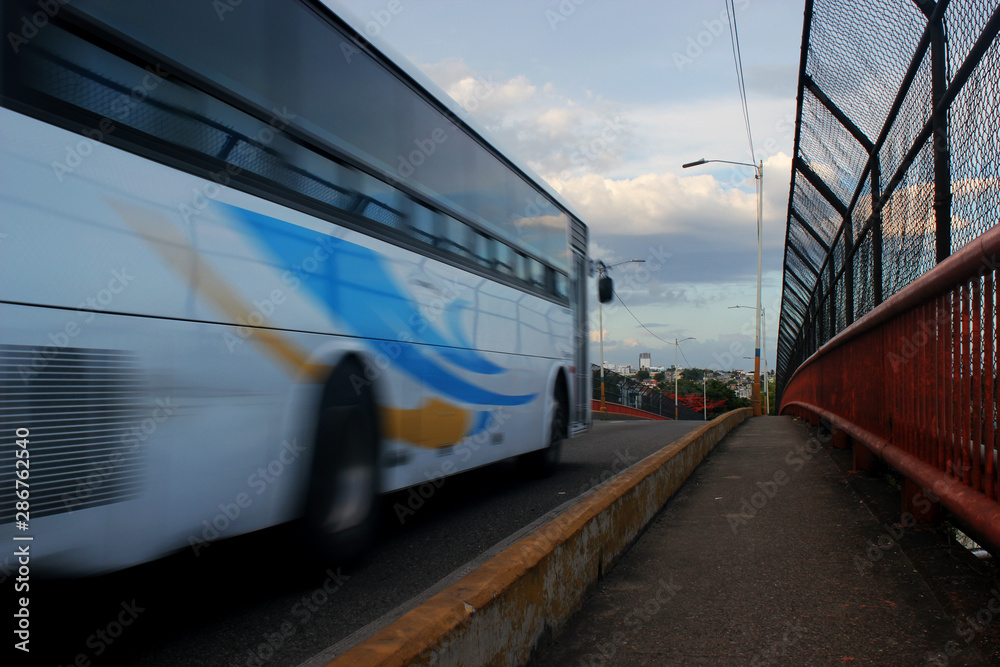 bus of the collective transport in the city of Santo Domingo while crossing a bridge