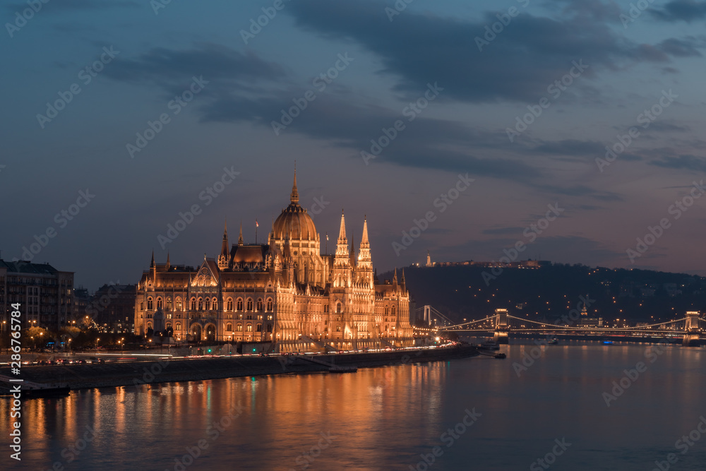 Aerial view of Budapest parliament and the Danube river at sunset, Hungary.