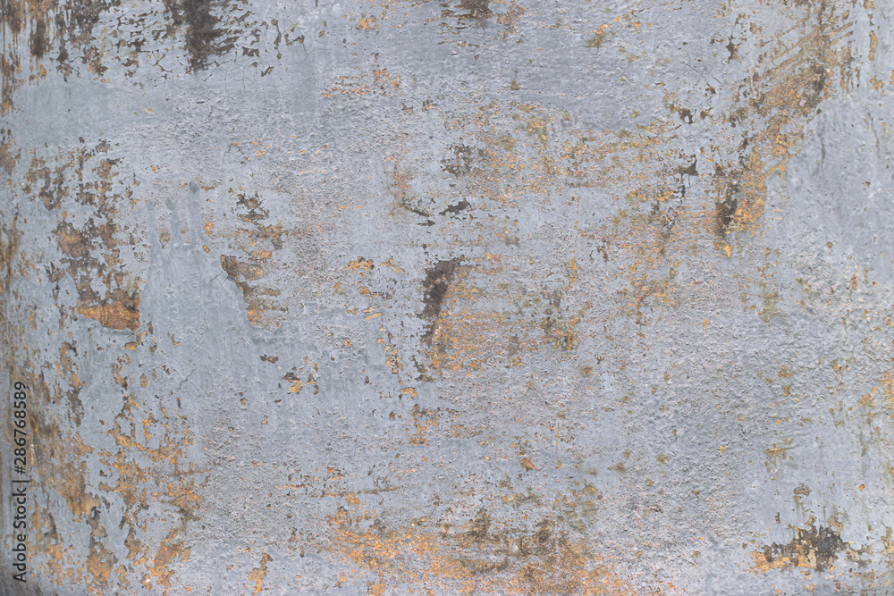 Old gray concrete wall with yellow and brown spots as an abstract background Old gray concrete wall with yellow and brown spots as an abstract background